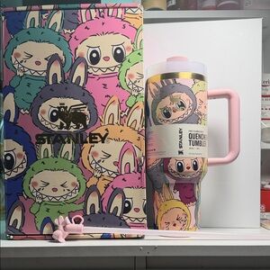 Stanley Cartoon Quencher Tumbler with Pink Handle